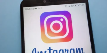 Instagram app logo displayed on a smartphone screen, representing the Gramho Instagram Viewer tool for viewing public Instagram profiles in 2026