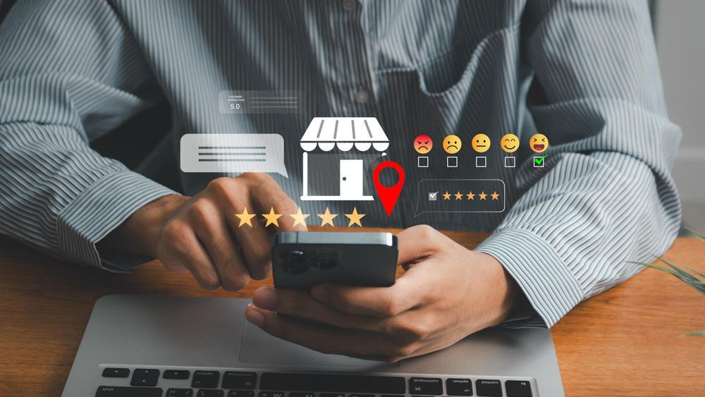 A person using a smartphone with Google reviews and location data, illustrating the importance of optimizing a plumbing website alongside Google Business Profile for local SEO.