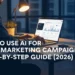 Alt Text: A digital marketer using AI tools on a laptop to automate and optimize email marketing campaigns in 2026, with email analytics dashboard and AI interface on screen