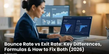 A digital marketer analyzing bounce rate and exit rate metrics in Google Analytics 4 on a laptop with session data funnel charts and page exit reports visible on screen in 2026