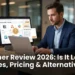A business professional researching HQPotner software on a laptop with a fact-checking checklist and comparison of project management alternatives like ClickUp Asana and Notion visible on screen in 2026
