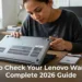 Person checking Lenovo laptop serial number and warranty status on official support website