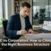Business founder comparing LLC and Corporation paperwork with laptop and legal documents