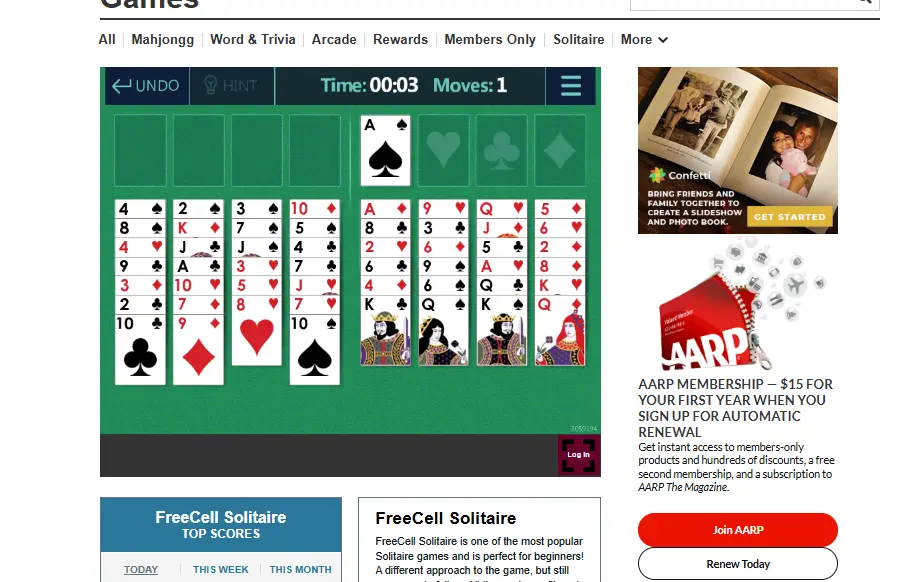 FreeCell Solitaire game board with all cards visible and free cells at the top